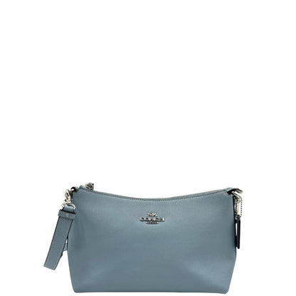 front Borsa Coach in pelle martellata color azzurro polvere, puoi portarla comodamente a spalla, a tracolla o a mano, di lusso, originale, ottime condizioni, usata. 