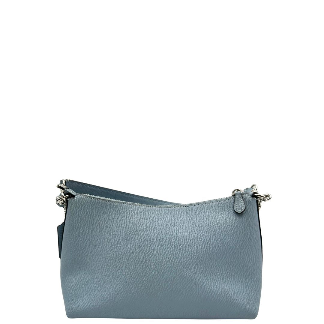 retro Borsa Coach in pelle martellata color azzurro polvere, puoi portarla comodamente a spalla, a tracolla o a mano, di lusso, originale, ottime condizioni, usata. 