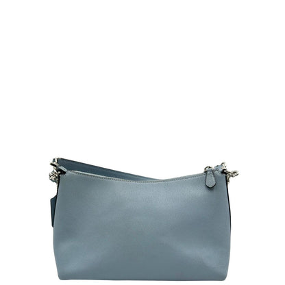 retro Borsa Coach in pelle martellata color azzurro polvere, puoi portarla comodamente a spalla, a tracolla o a mano, di lusso, originale, ottime condizioni, usata. 