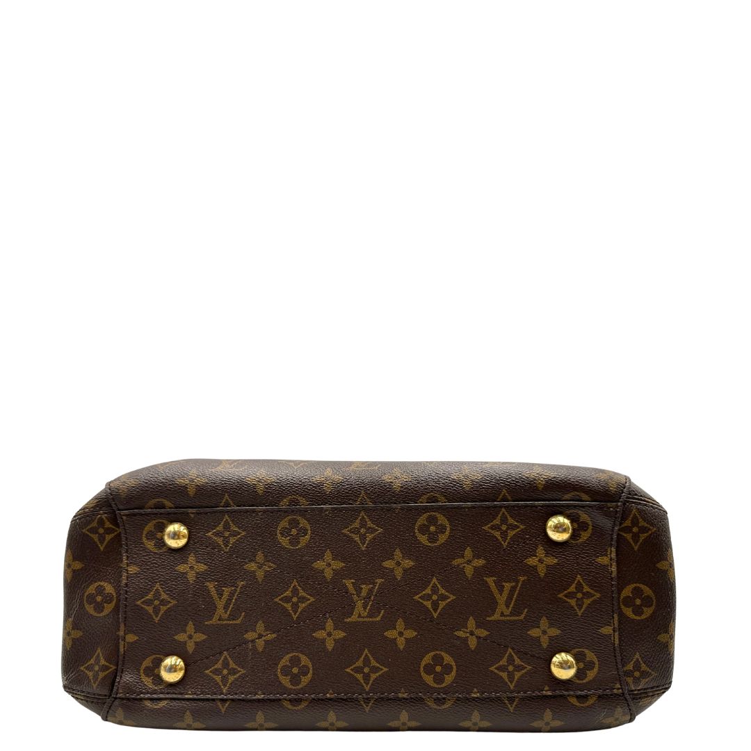 Base, Borsa Louis Vuitton Montaigne nella versione media in canvas marrone e hardware dorato, indossabile a mano oppure a spalla. Originale, usata, di lusso, in ottime condizioni.