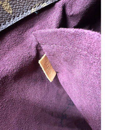 Codice, Borsa Louis Vuitton Montaigne nella versione media in canvas marrone e hardware dorato, indossabile a mano oppure a spalla. Originale, usata, di lusso, in ottime condizioni.