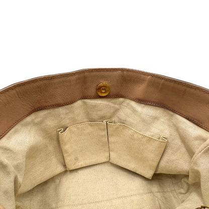 Interno,  Shopper Gucci in tessuto beige GG con finiture in pelle rosa. Indossabile a spalla. Originale, usata, di lusso, in ottime condizioni.