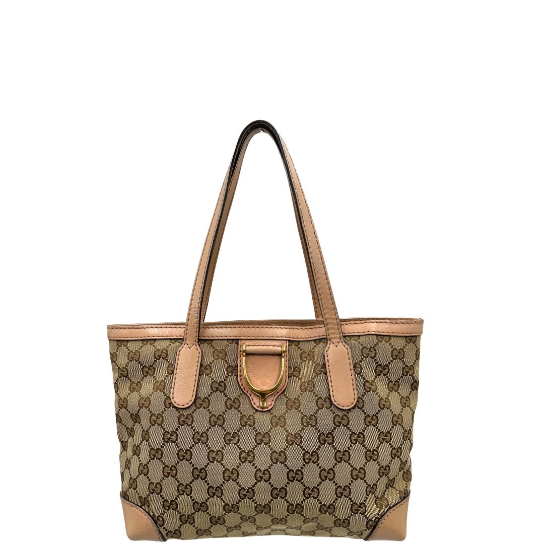 Front, Shopper Gucci in tessuto beige GG con finiture in pelle rosa. Indossabile a spalla. Originale, usata, di lusso, in ottime condizioni.