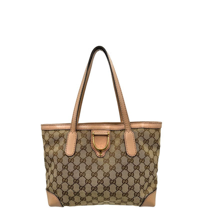 Front, Shopper Gucci in tessuto beige GG con finiture in pelle rosa. Indossabile a spalla. Originale, usata, di lusso, in ottime condizioni.
