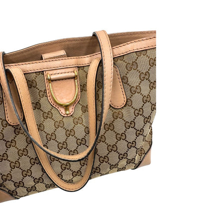 Manici, Shopper Gucci in tessuto beige GG con finiture in pelle rosa. Indossabile a spalla. Originale, usata, di lusso, in ottime condizioni.