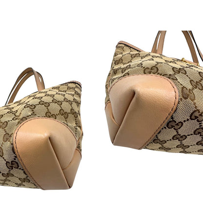 Angoli, Shopper Gucci in tessuto beige GG con finiture in pelle rosa. Indossabile a spalla. Originale, usata, di lusso, in ottime condizioni.