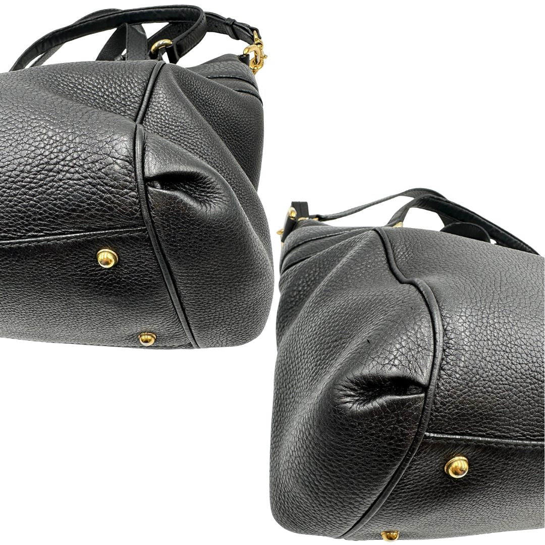 Angoli, Borsa Gucci in pelle nera con hardware dorato, indossabile a spalla oppure a tracolla. Originale, usata, di lusso, in ottime condizioni.