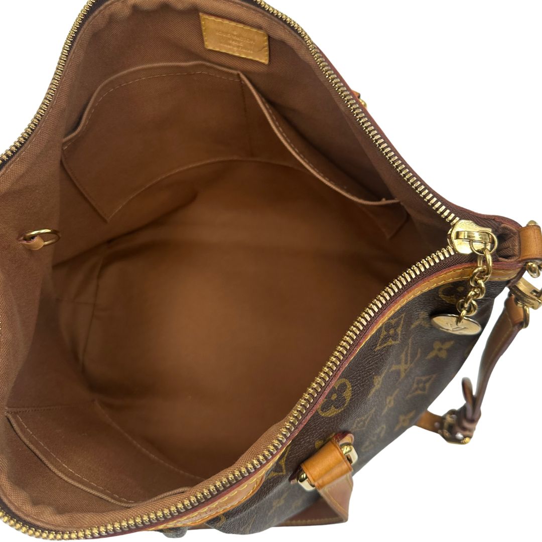 interno Borsa LV strutturata in tela monogram e vacchetta naturale, nella misura PM, di lusso, originale, ottime, condizioni, usata.
