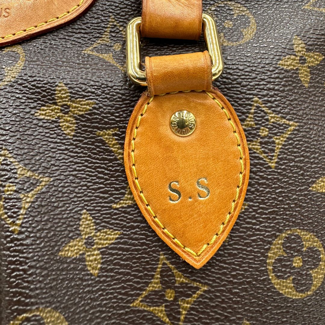 Borsa LV strutturata in tela monogram e vacchetta naturale, nella misura PM, di lusso, originale, ottime, condizioni, usata.