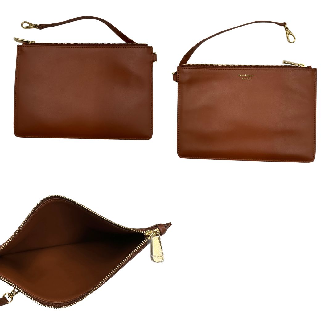 Pochette interna, Borsa Tote Salvatore Ferragamo in pelle marrone cognac e manici in pelle con inserti in catena, hardware dorato. Indossabile a spalla.