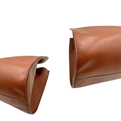 Angoli, Borsa Tote Salvatore Ferragamo in pelle marrone cognac e manici in pelle con inserti in catena, hardware dorato. Indossabile a spalla.