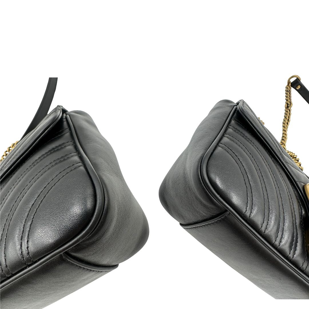 Angoli, Borsa Gucci Marmont nera in pelle con motivo chevron nella misura media. Indossabile a tracolla oppure a spalla. Originale, usata, di lusso, in ottime condizioni.