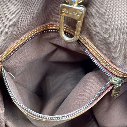 interno Borsa LV in canvas monogram e finiture in vacchetta naturale, di lusso, originale, ottime condizioni, usata. 