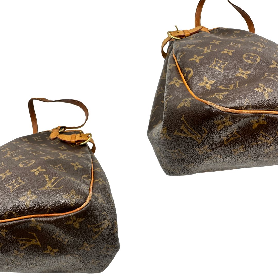 angoli Borsa LV in canvas monogram e finiture in vacchetta naturale, di lusso, originale, ottime condizioni, usata. 