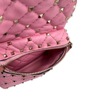 internol Zaino V. G. in pelle rosa impreziosito da borchie piramidali su tutta la superficie, di lusso, originale, ottime condizioni, usato.