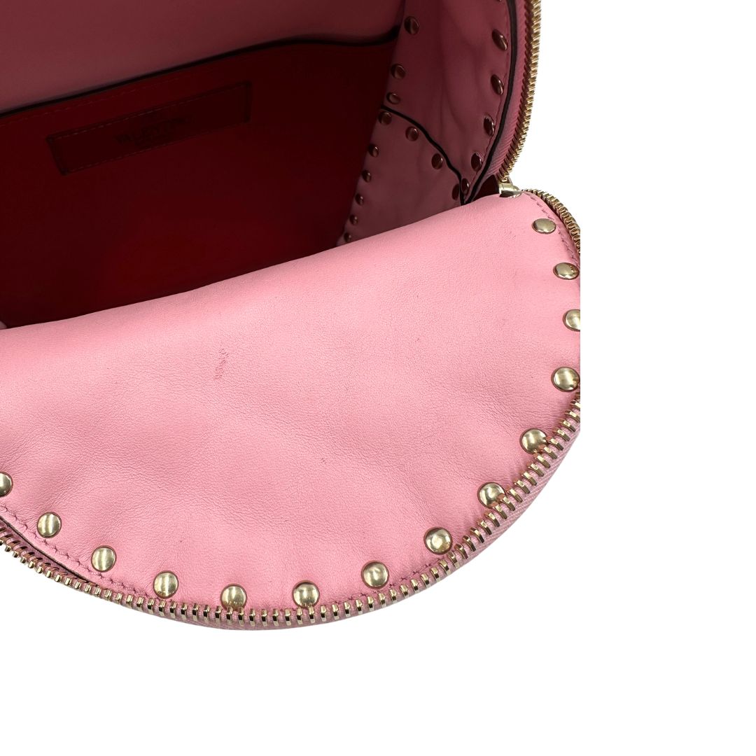 Zaino V. G. in pelle rosa impreziosito da borchie piramidali su tutta la superficie, di lusso, originale, ottime condizioni, usato. 