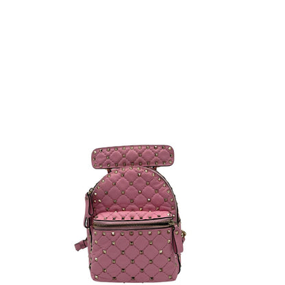 front Zaino V. G. in pelle rosa impreziosito da borchie piramidali su tutta la superficie, di lusso, originale, ottime condizioni, usato. 