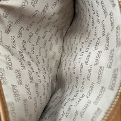 interno borsa MK in pelle martellata color cammello, di lusso, originale, ottime condizioni, usata.
