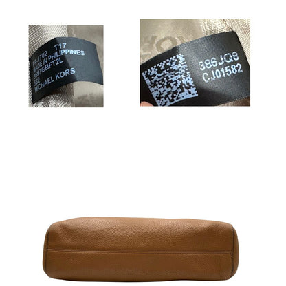 base borsa MK in pelle martellata color cammello, di lusso, originale, ottime condizioni, usata.