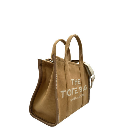 Laterale, Borsa The Tote Bag Marc Jacobs in tessuto Jacquard con tracolla regolabile e amovibile in tessuto bianco con parti metalliche argentate. Originale, usata, di lusso in condizioni eccellenti.