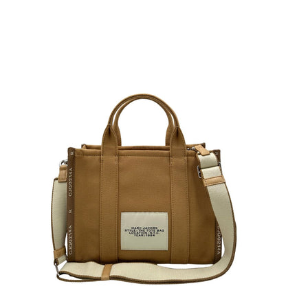 Retro, Borsa The Tote Bag Marc Jacobs in tessuto Jacquard con tracolla regolabile e amovibile in tessuto bianco con parti metalliche argentate. Originale, usata, di lusso in condizioni eccellenti.