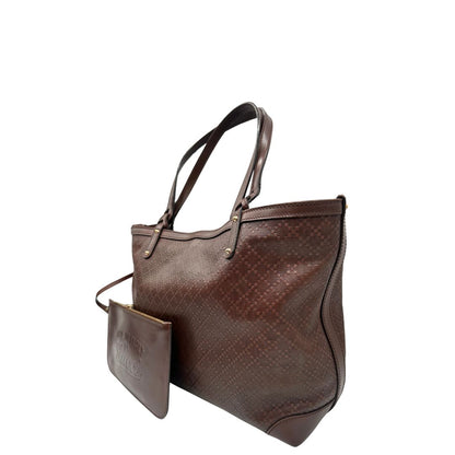 Laterale, Borsa Tote Gucci in pelle marrone cioccolato e hardware dorato, indossabile a spalla. Originale, usata, di lusso, in ottime condizioni.