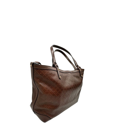 Laterale, Borsa Tote Gucci in pelle marrone cioccolato e hardware dorato, indossabile a spalla. Originale, usata, di lusso, in ottime condizioni.