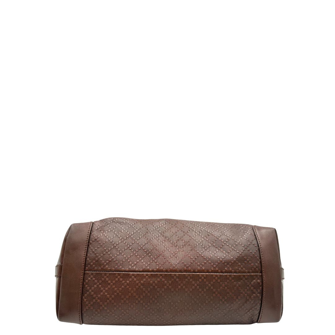 Base, Borsa Tote Gucci in pelle marrone cioccolato e hardware dorato, indossabile a spalla. Originale, usata, di lusso, in ottime condizioni.
