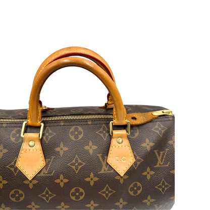 Manici, Speedy Louis Vuitton monogram nella misura 30. Originale, usato, di lusso, in ottime condizioni.