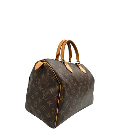 Laterale, Speedy Louis Vuitton monogram nella misura 30. Originale, usato, di lusso, in ottime condizioni.