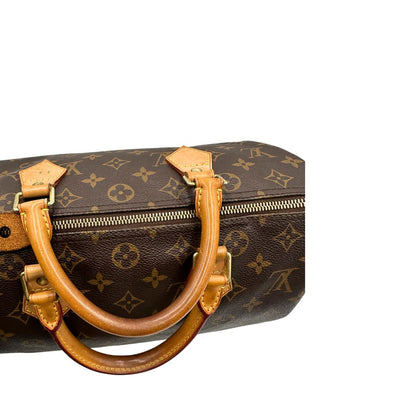 Manici, Speedy Louis Vuitton monogram nella misura 30. Originale, usato, di lusso, in ottime condizioni.