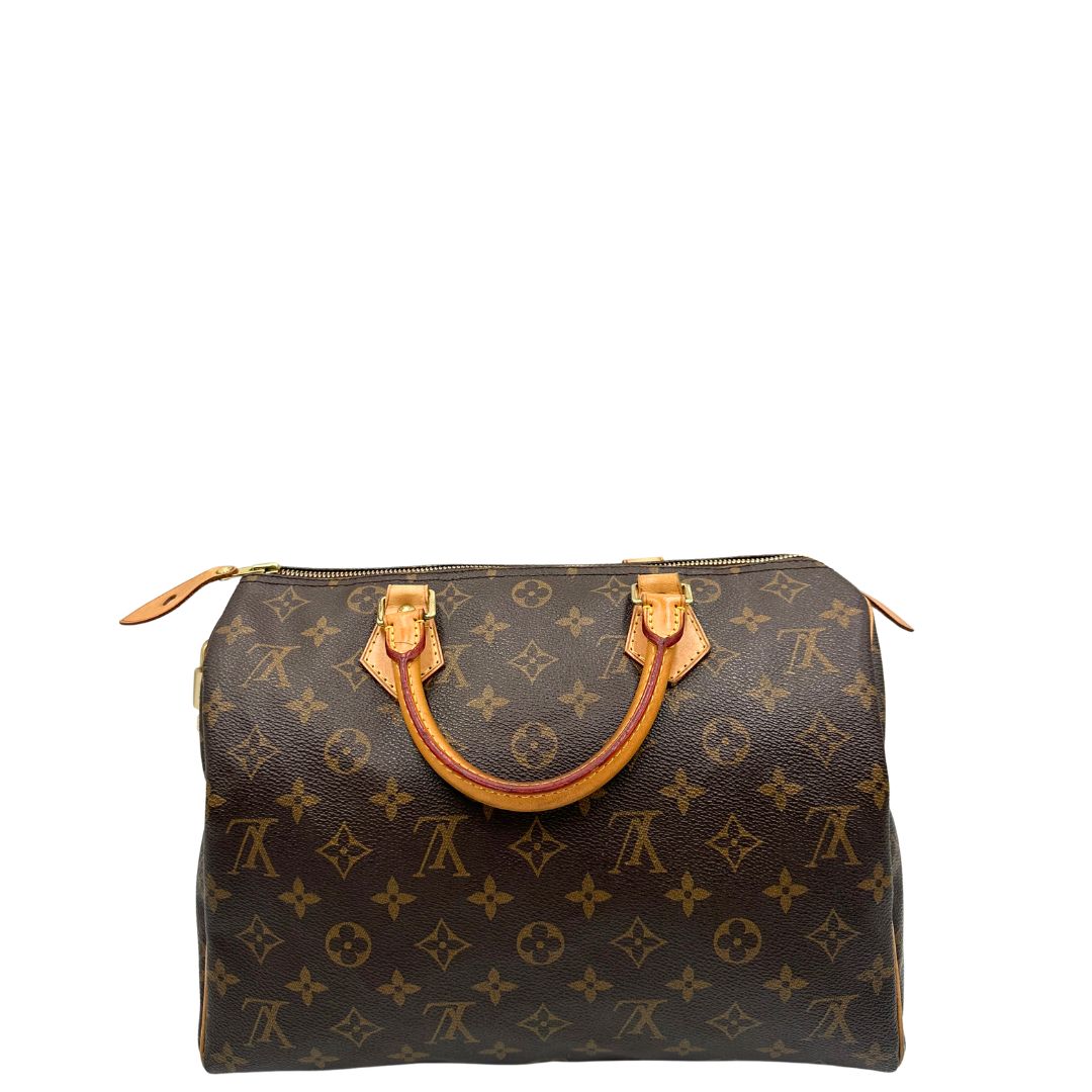 Retro, Speedy Louis Vuitton monogram nella misura 30. Originale, usato, di lusso, in ottime condizioni.