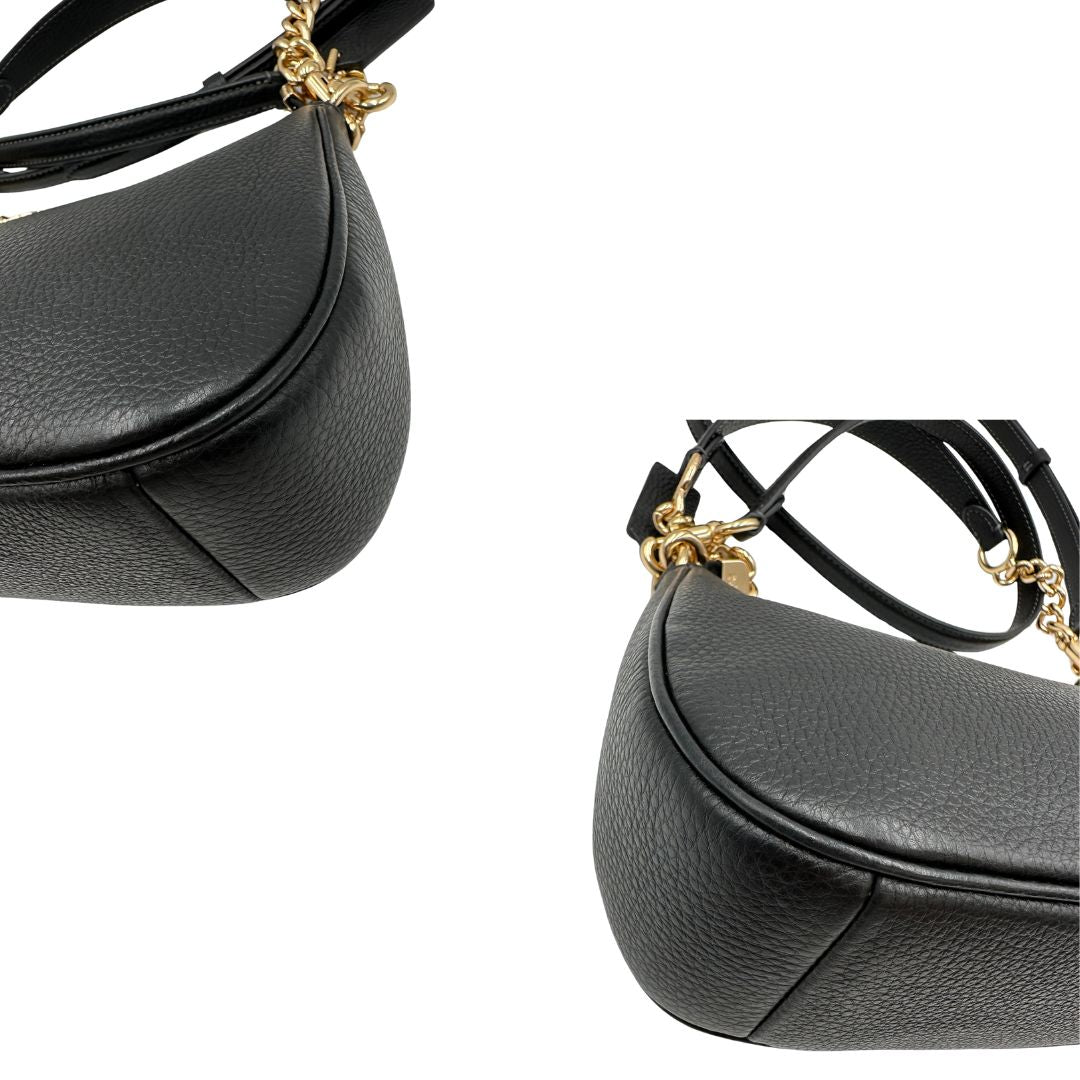 angoli Borsa Coach in pelle martellata nera, puoi portarla comodamente a spalla, a tracolla o a mano, di lusso, originale, ottime condizioni, usata. 