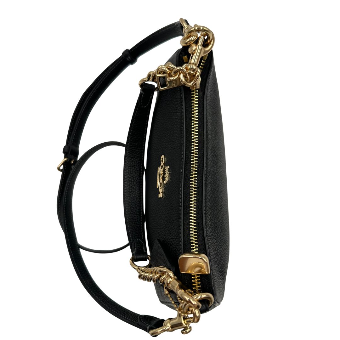 chiusura Borsa Coach in pelle martellata nera, puoi portarla comodamente a spalla, a tracolla o a mano, di lusso, originale, ottime condizioni, usata. 