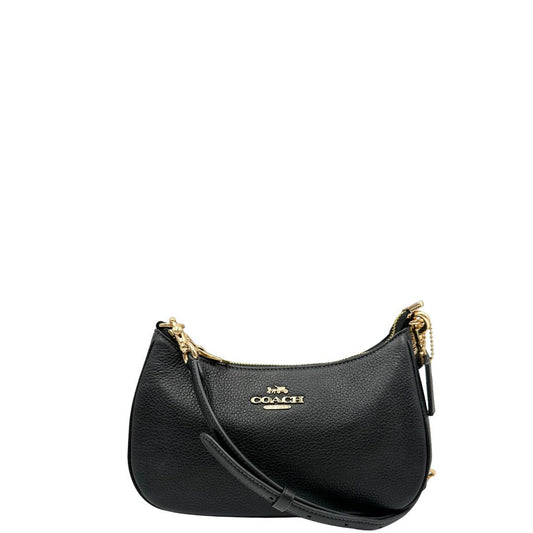 front Borsa Coach in pelle martellata nera, puoi portarla comodamente a spalla, a tracolla o a mano, di lusso, originale, ottime condizioni, usata. 