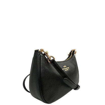 lato Borsa Coach in pelle martellata nera, puoi portarla comodamente a spalla, a tracolla o a mano, di lusso, originale, ottime condizioni, usata. 