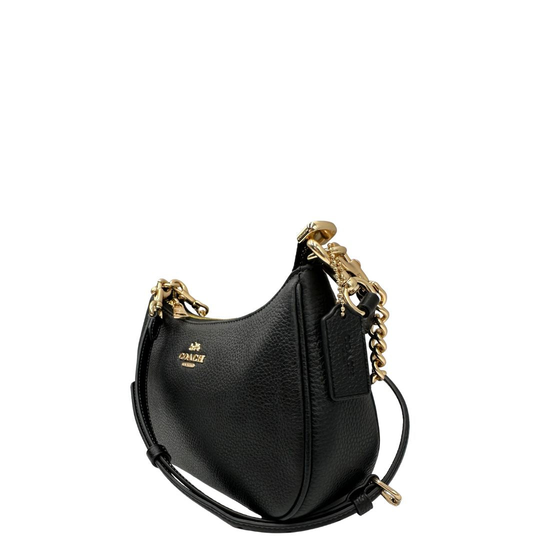 lato Borsa Coach in pelle martellata nera, puoi portarla comodamente a spalla, a tracolla o a mano, di lusso, originale, ottime condizioni, usata. 