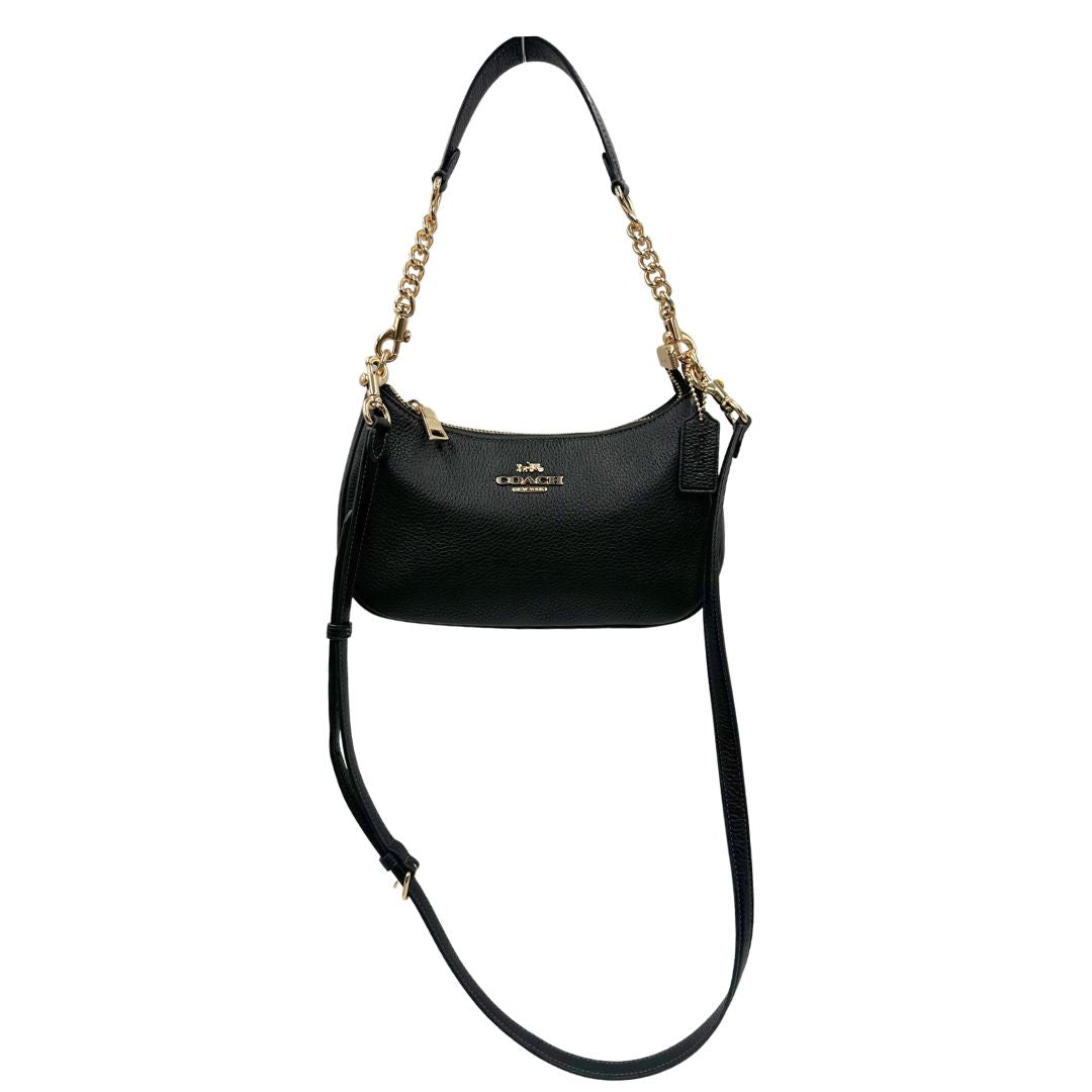front Borsa Coach in pelle martellata nera, puoi portarla comodamente a spalla, a tracolla o a mano, di lusso, originale, ottime condizioni, usata. 