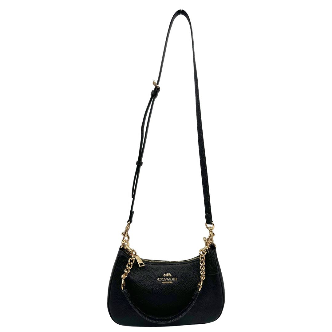 front Borsa Coach in pelle martellata nera, puoi portarla comodamente a spalla, a tracolla o a mano, di lusso, originale, ottime condizioni, usata. 