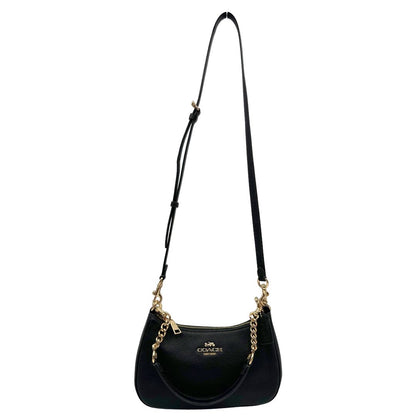 front Borsa Coach in pelle martellata nera, puoi portarla comodamente a spalla, a tracolla o a mano, di lusso, originale, ottime condizioni, usata. 
