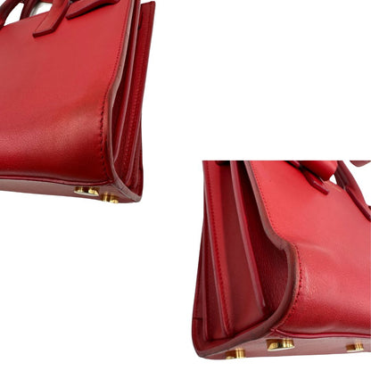 angoli Borsa Saint Laurent in pelle rossa, indossabile a tracolla o a mano, di lusso, originale, ottime condizioni. 