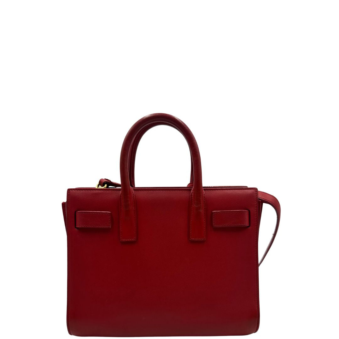 retro Borsa Saint Laurent in pelle rossa, indossabile a tracolla o a mano, di lusso, originale, ottime condizioni. 