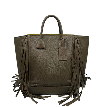 retro Borsa Prada in pelle martellata verde impreziosita da frange sui profili, di lusso, originale, ottime condizioni, usata.