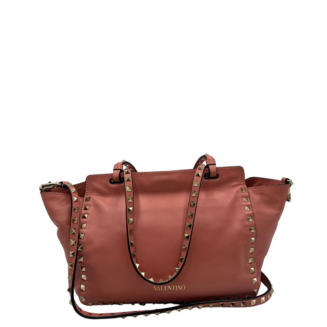 retro Borsa V. G. in pelle color rosa salmone impreziosita da borchie piramidali, di lusso, originale, ottime condizioni. 