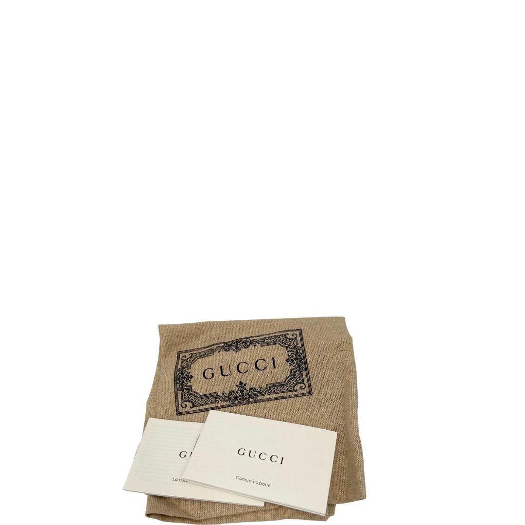 dustbag Borsa Gucci in canvas GG e finiture in pelle color bianco latte, di lusso, originale, usata.