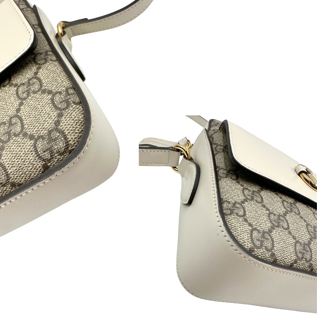 angoli Borsa Gucci in canvas GG e finiture in pelle color bianco latte, di lusso, originale, usata. 