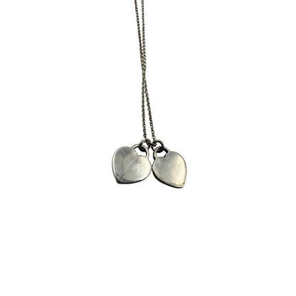 Collana Tiffany&Co. in argento 925 con ciondoli heart, di lusso, originale, ottime condizioni, usata.