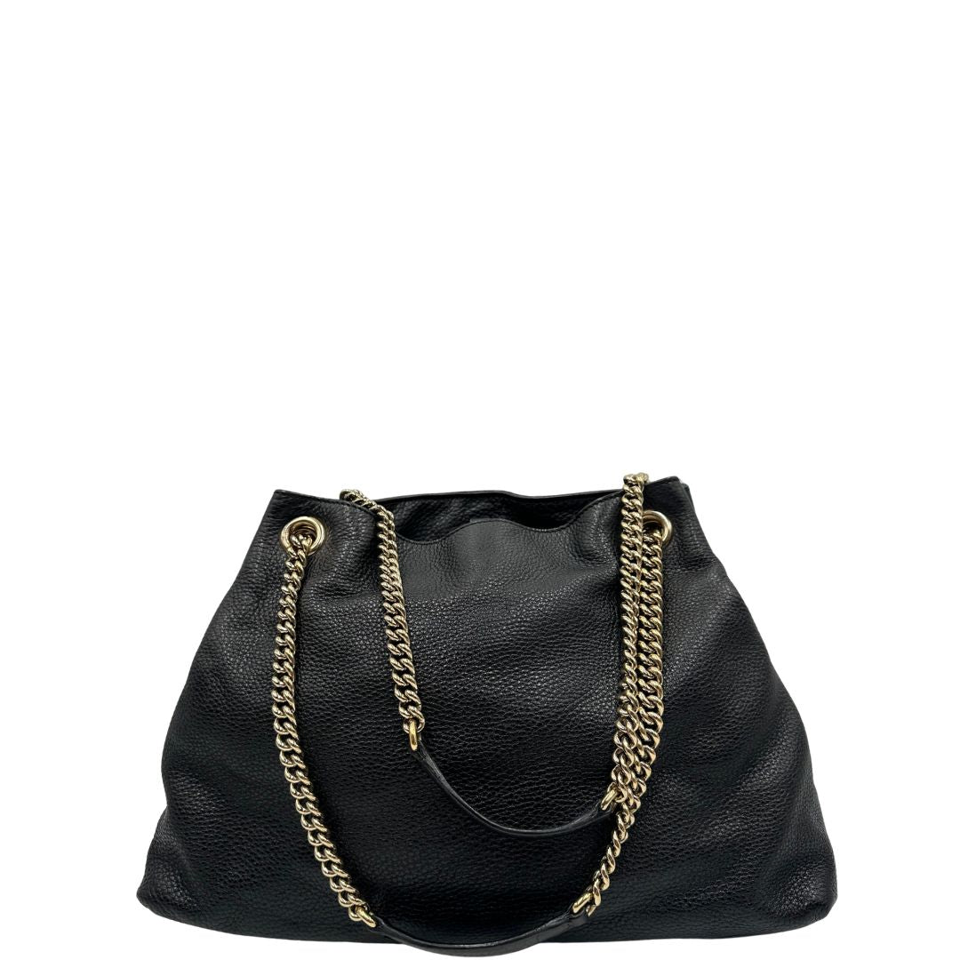 retro Borsa Gucci in pelle nera munita di doppi manici, indossabile a spalla, di lusso, originale, ottime condizioni, usata. 