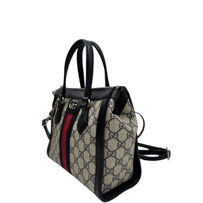 lato Borsa Gucci in canvas GG, finiture in pelle blu e impreziosita da striscia Web rossa e blu, di lusso, originale, usata 