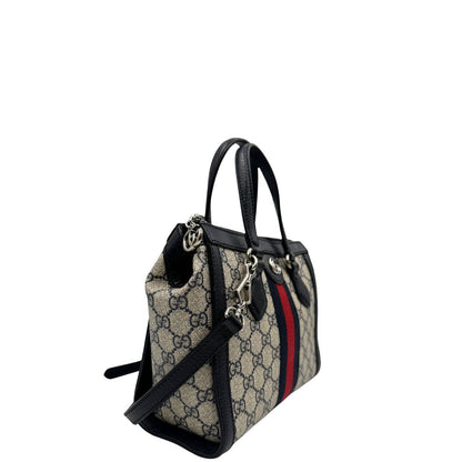 lato Borsa Gucci in canvas GG, finiture in pelle blu e impreziosita da striscia Web rossa e blu, di lusso, originale, usata 